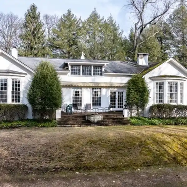 CHARMING FRENCH COLONIAL ON NEARLY THREE ACRES