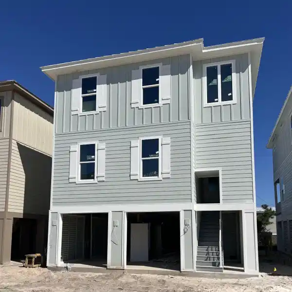 FIVE BEDROOM NEW CONSTRUCTION IN A GATED PERDIDO KEY COMMUNITY