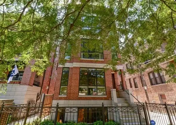 EXQUISITE BRICK DUPLEX WITH SOPHISTICATED ENTERTAINING SPACES