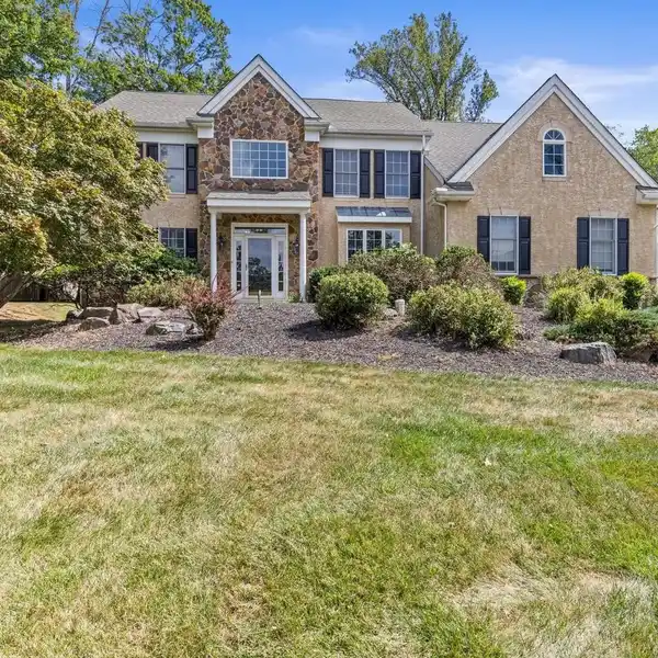 STUNNING TWO-STORY FAMILY HOME WITH DECK