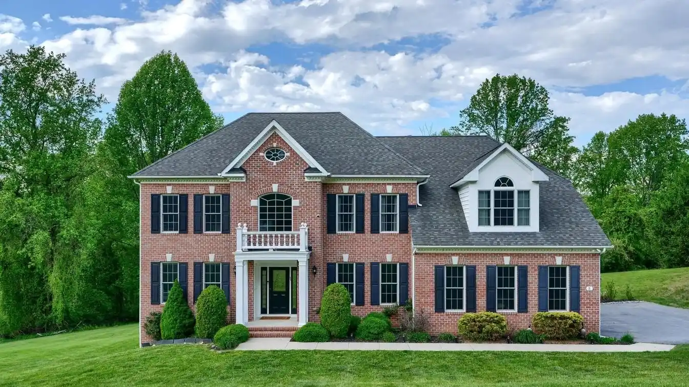 Elegant Colonial Retreat on Private 4-acre Estate