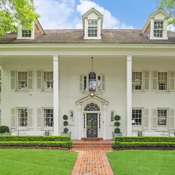 THOUGHTFULLY UPDATED 1926 HOME ON BEAUTIFUL GROUNDS