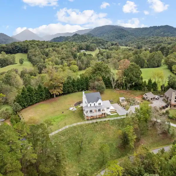 CUSTOM FARMHOUSE WITH BREATHTAKING LONG-RANGE MOUNTAIN VIEWS