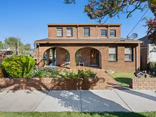 Cherished Home in Commanding Corner Position