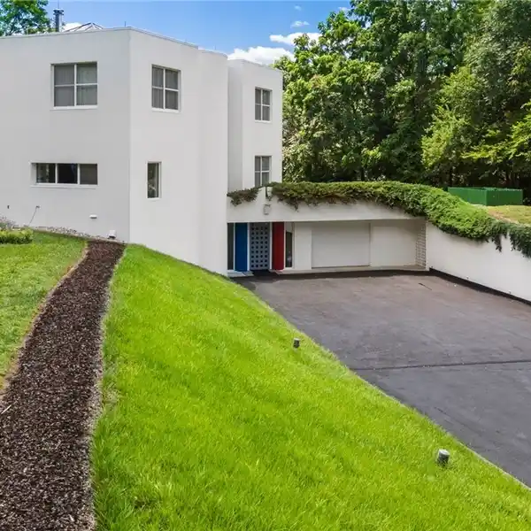 CONTEMPORARY-INTERNATIONAL STYLE HOME IN COVETED PEMBROKE