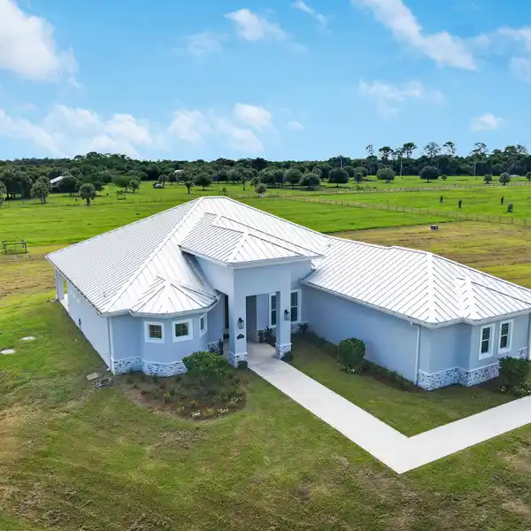 STUNNING RANCH-STYLE HAVEN WITH SERENE ACREAGE AND MODERN FLAIR