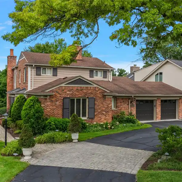LOVELY CLASSIC COLONIAL ON BEAUTIFULLY WOODED LOT