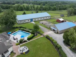 Nearly 11-Acre Equestrian Facility with Updated Cottage-Style Home