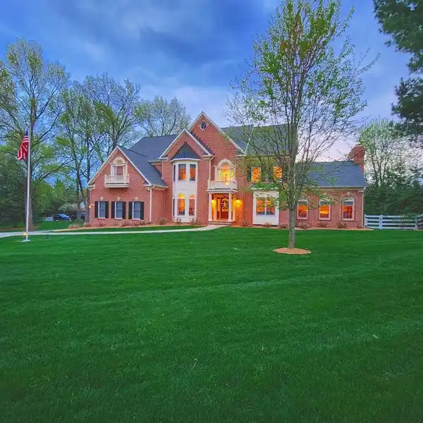 GATED COLONIAL RETREAT WITH GRAND ENTERTAINING SPACES