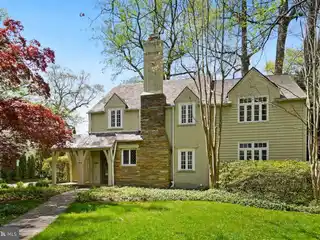 Charming Tudor with Spacious Backyard Oasis