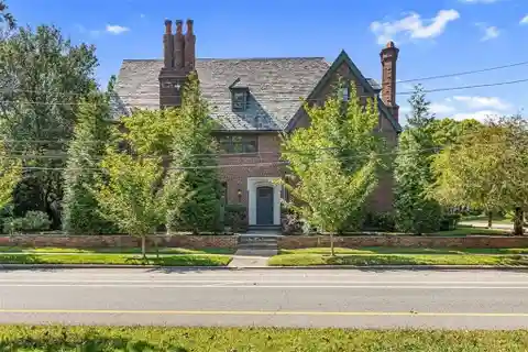 Handsome Brick Tudor Revival Style Home
