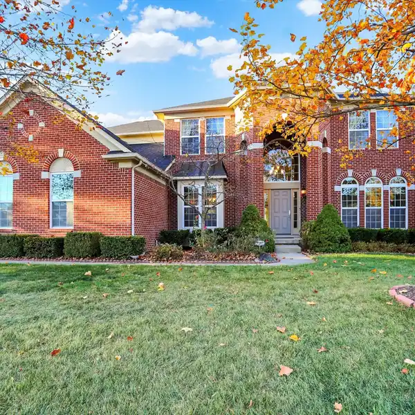 ELEGANT ESTATE WITH SERENE WOODED VIEWS
