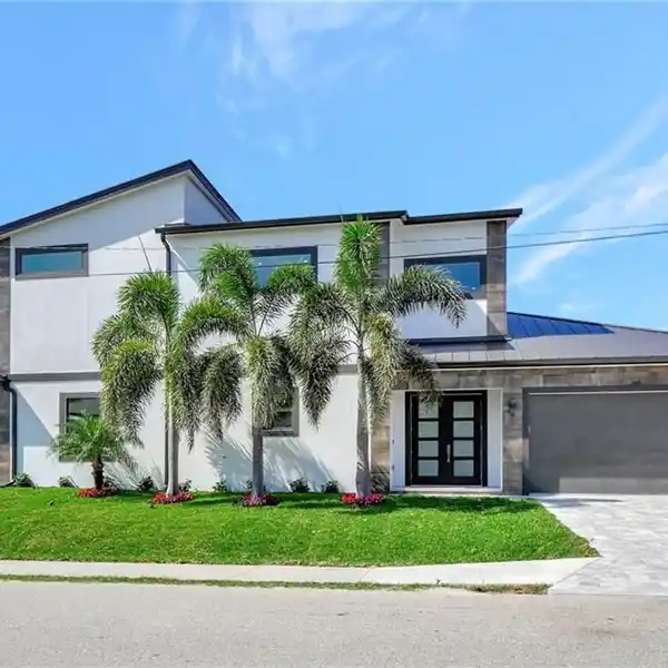 NEWLY CONSTRUCTED MODERN RESIDENCE ON IDEAL CORNER LOT