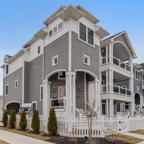 ELEGANT LIVING WITH CATHEDRAL CEILINGS