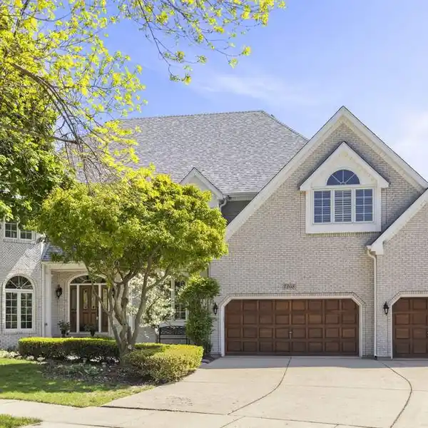 STUNNING CUSTOM HOME WITH LUXURIOUS UPGRADES