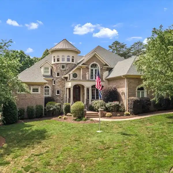 ELEGANCE AND SOPHISTICATION ABOUND IN THIS STATELY CUSTOM ESTATE