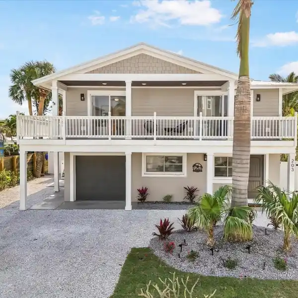 ELEGANCE WITH COASTAL CHARM IN THE HEART OF HOLMES BEACH