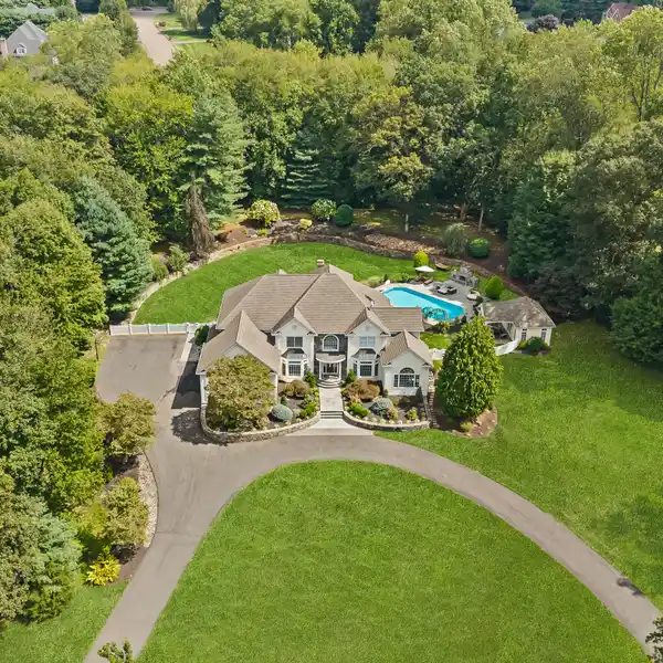 LUXURY COLONIAL IN PRESTIGIOUS HIDDEN POND ESTATES