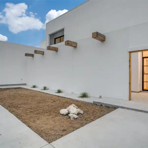 MODERN SPANISH MISSION ESTATE ON A CREEK LOT