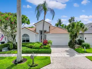 Lakefront Luxury in Prestigious Country Club Community