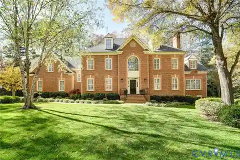 Sophisticated Home with Large Arched Picture Window