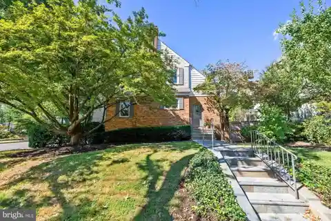 Historic Tudor with Modern Upgrades and Prime Location
