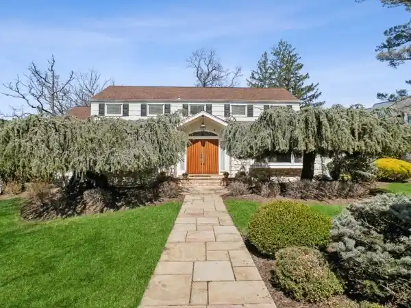 BEAUTIFULLY RENOVATED AND TASTEFULLY EXPANDED HOME