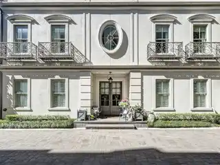 Elegant Gated Residence with Elevator and Gourmet Kitchen