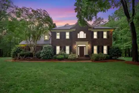 Charming Brick Home on a Wooded Lot