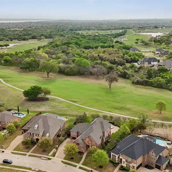 STUNNING EXECUTIVE POOL HOME IN IDEAL TROPHY CLUB LOCATION