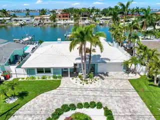 Magnificent Waterfront Home in Coveted Oakhurst Shores