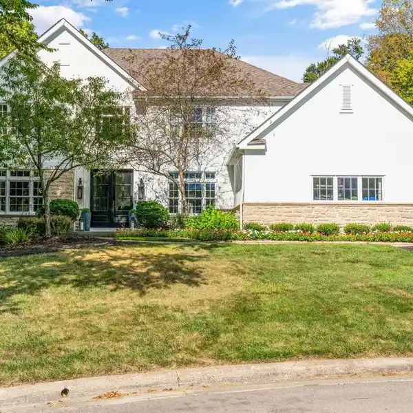 WALKOUT LOWER-LEVEL LUXURY HOME ON A WOODED RAVINE LOT