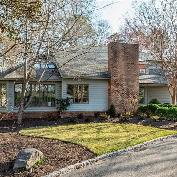UNIQUE MID-CENTURY MODERN HOME IN COVETED NEIGHBORHOOD