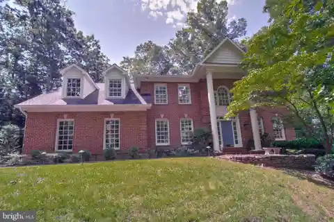 Impeccably Updated Brick Home with Outdoor Kitchen