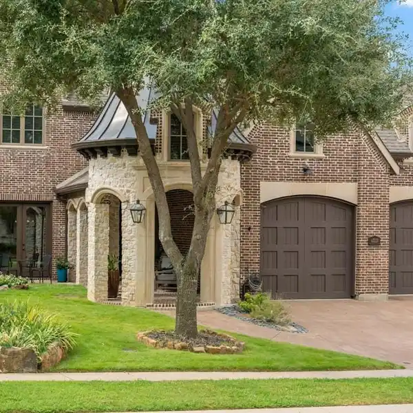 STUNNING TRADITIONAL HOME ON A LUSH LOT