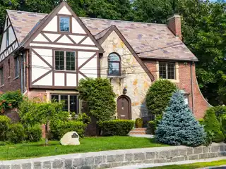 Stunning Brick Tudor Home on a Magnificent Corner Lot