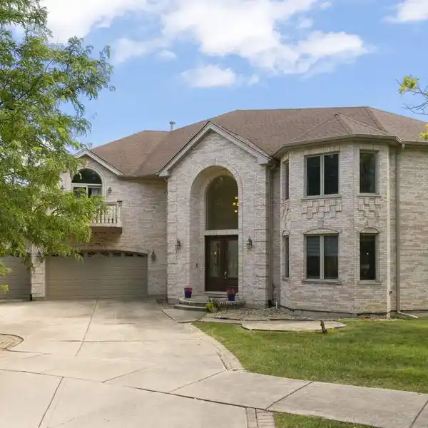 DISTINGUISHED NORTH-FACING ALL-BRICK RESIDENCE