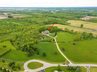 Versatile Estate on Private Acreage with Views
