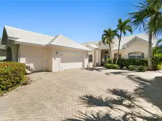 Immaculately Maintained Home with Sweeping Golf and Lake Views
