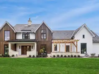 Belgian-Inspired Masterpiece with Cathedral Ceilings