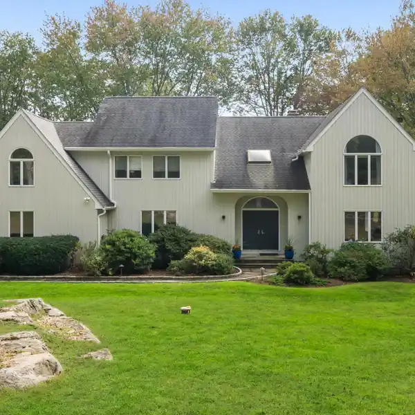 EXCEPTIONAL HOME ON SIX LUSH ACRES