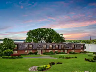 Elegant Lakefront Condo with Sunset Deck Views