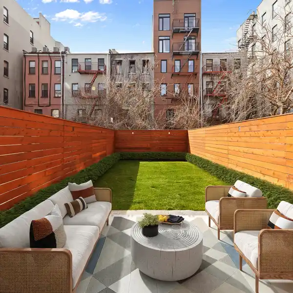 CHARMING PARK BLOCK TOWNHOME IN PRIME HARLEM LOCATION
