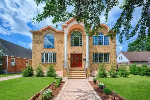 Grand Brick Home with Elegant Modern Updates