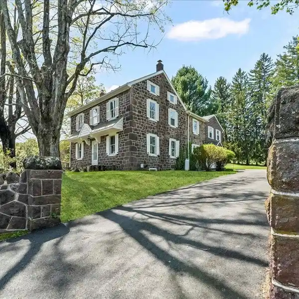 HISTORIC STONE FARMHOUSE WITH POND AND BARN