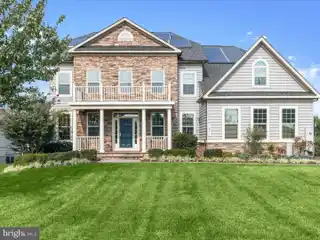 Spectacular Colonial Tucked Away in Prestigious Community