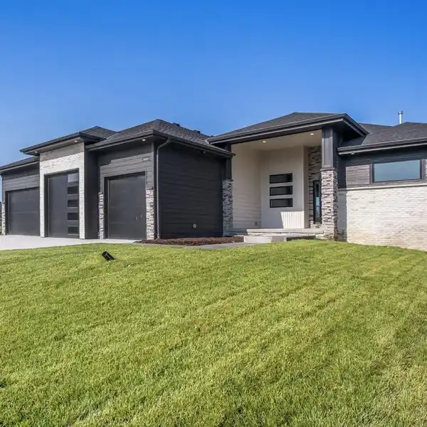 MODERN ELKHORN RANCH WITH COVERED DECK AND FOUR-CAR GARAGE