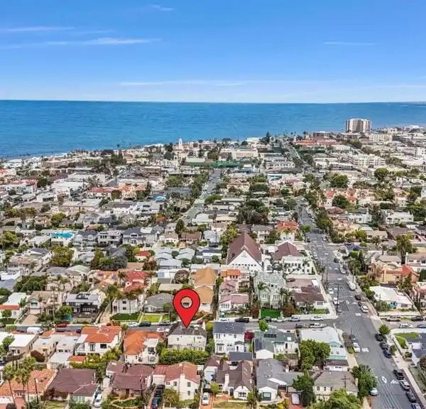 POTENTIAL-PACKED BEACHSIDE HOME