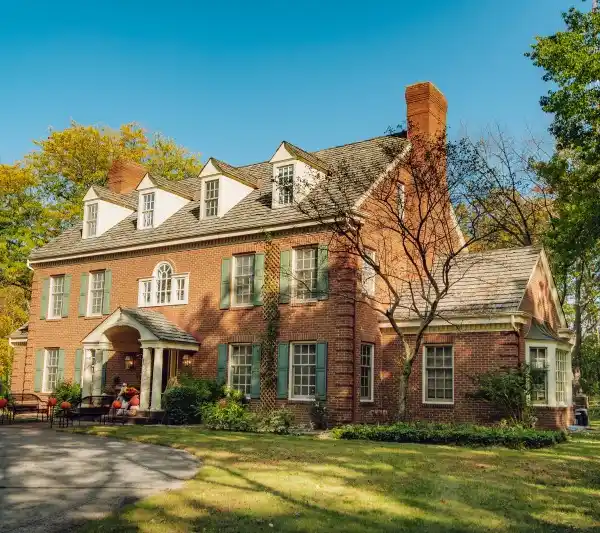 THREE-STORY ALL BRICK TRADITIONAL COLONIAL