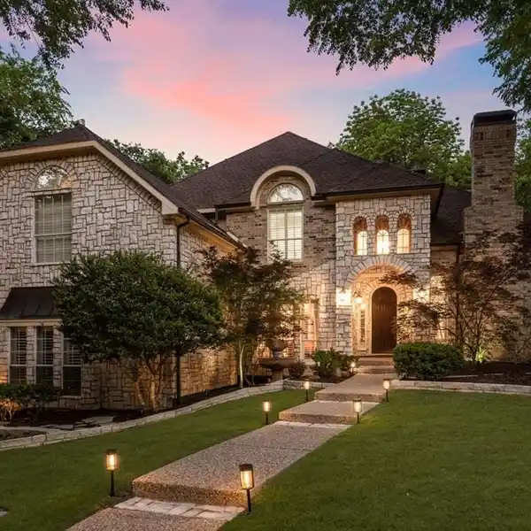 CUSTOM BUILT STONE AND BRICK HOME